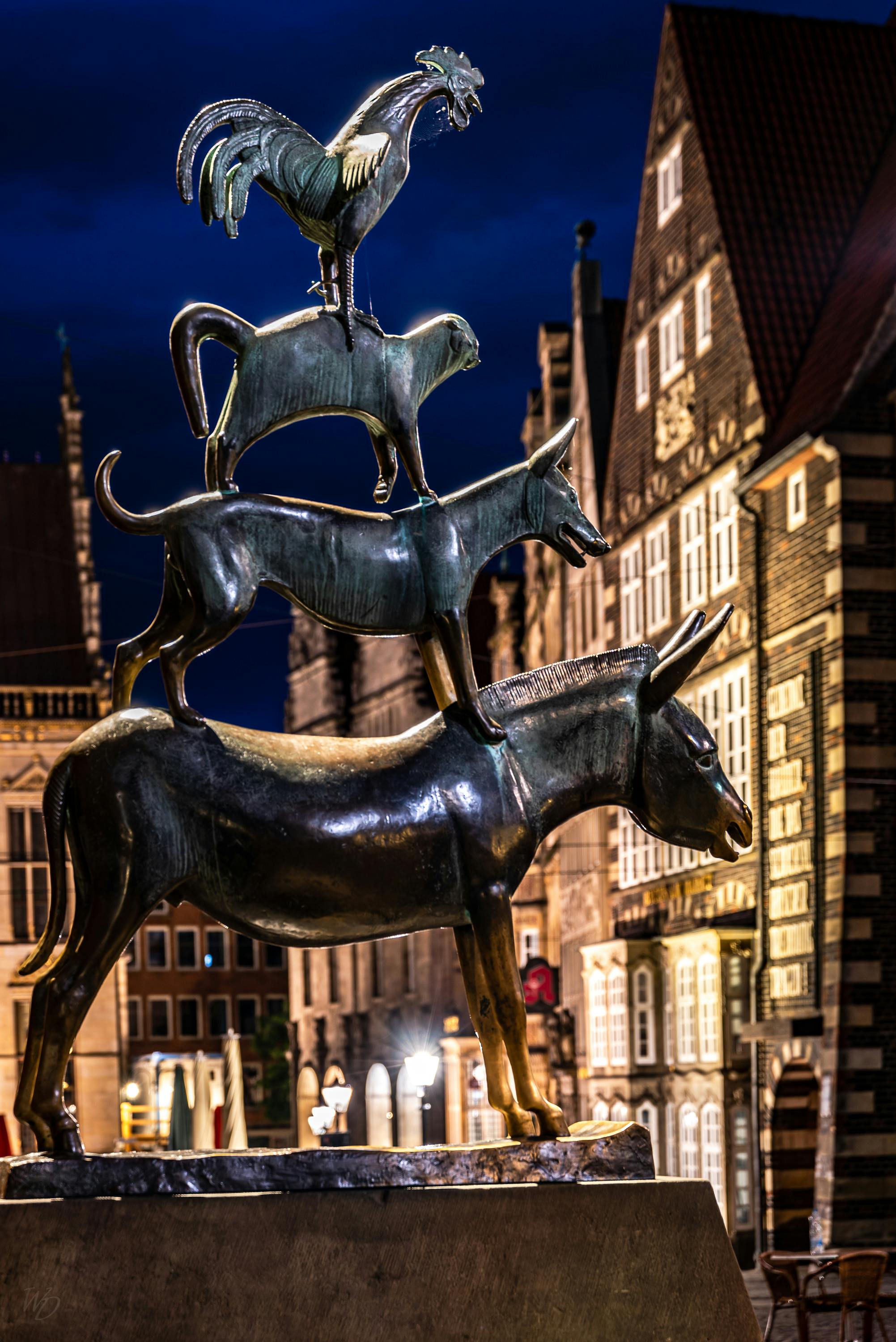 Bremen Town Musicians statue at night on the Fairytale Route